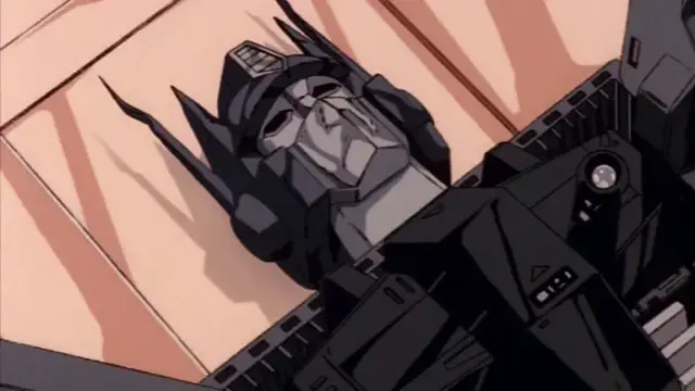 Optimus prime lying cold and lifeless on the ground