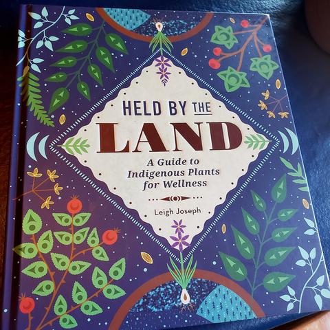 Held by the Land: A Guide to Indigenous Plants for Wellness
By Leigh Joseph. Cover of hardcover book. It has Indigenous botanical illustrations on it.