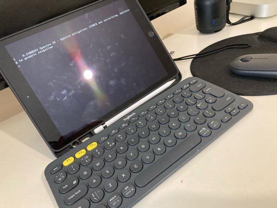 Image of an iPad 7th Gen with a Logitech K380 Bluetooth keyboard and Logitech pebble. It’s booting into Ubuntu 14.04 with 768MB of RAM, although it’s failing to boot in reality.