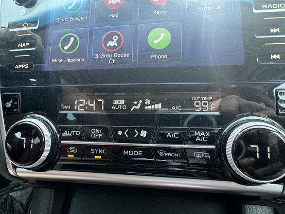 Dash of a car showing the time not yet 1pm but the temp already 99F. Humidity is higher today than yesterday due to last night’s thunderstorm.
