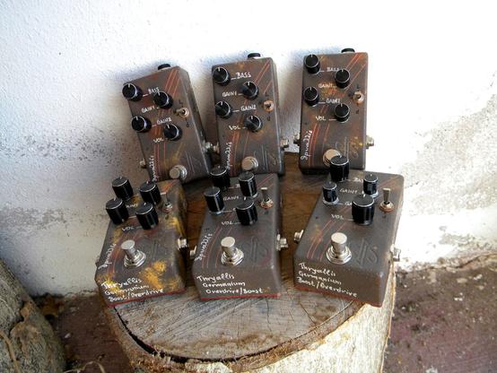 pedal effects on a wooden log