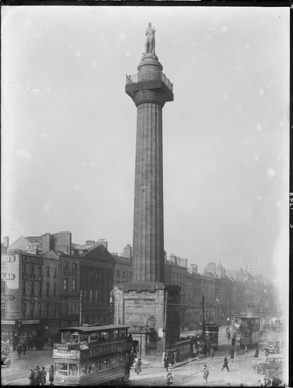 Nelson's Pillar on O'Connell Street, Dublin with an assortment of trams - the no. 8 to Dalkey; the no. 29 to Fairview; the no. 20 to Rialto Bridge; and I think the no. 3 to Westland Row and Ringsend; and a car with reg. no. IK 9729. c1927. The National Library of Ireland. No known copyright restrictions.