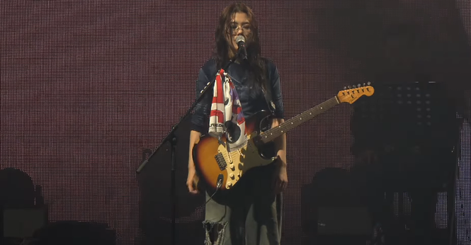 SoYoon and her guitar, onstage in Seoul.