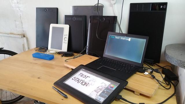 A desk and a bunch of graphics tablets I had in stock. It's all in my garage. Among the tablets shown in the photo (top left to bottom right):
- Wacom Intuos Pro L
- Wacom Bamboo Fun Medium
- Gaomon M10K 2018
- Wacom Intuos 3 Large
- Wacom Intuos 4 Medium
- Huion WH1409 (v1)
- Wacom Cintiq 13HD (plugged)