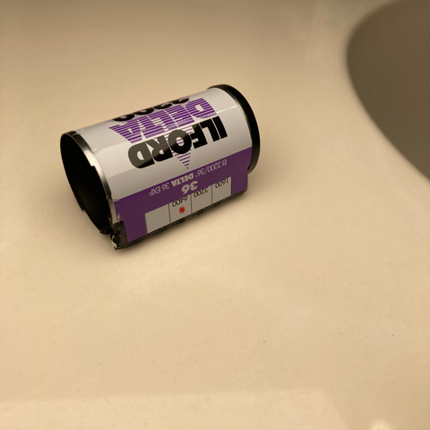Photo of opened Ilford Delta 3200 roll with the 6400 area marked with a marker