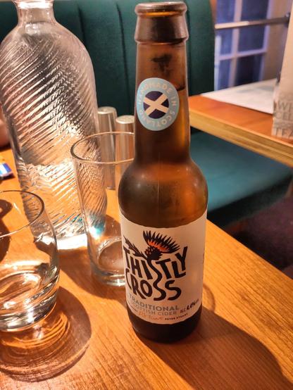 A bottle of Thistly Cross, traditional Scottish cider handmade in Scottland.