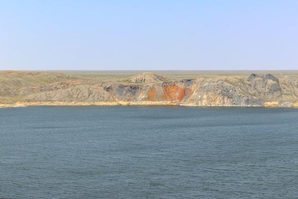 A large blue lake in the Kazakh steppe