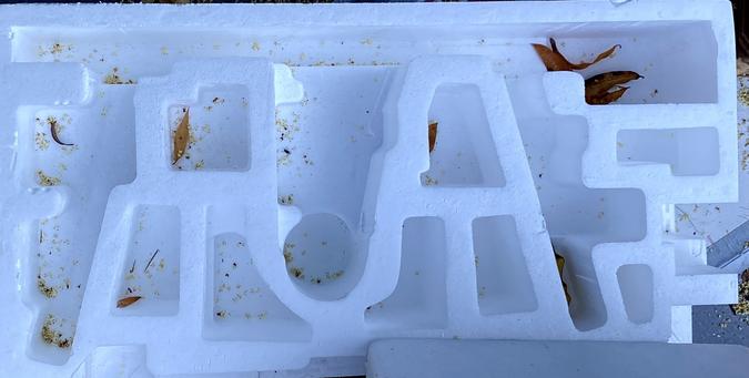 Styrofoam packaging. The support shapes make forms that look like letters