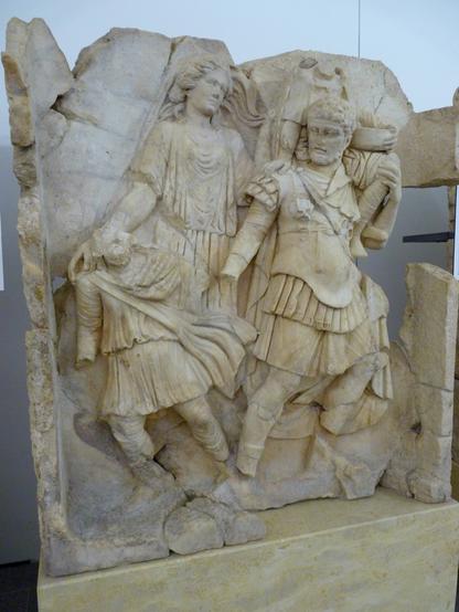 Bas-relief showing Aeneas fleeing Troy, carrying his aged father on his shoulder.