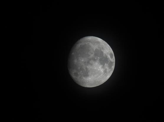 a shot of the Moon before Full Moon (Waxing Gibbous), with some craters (barely) visible