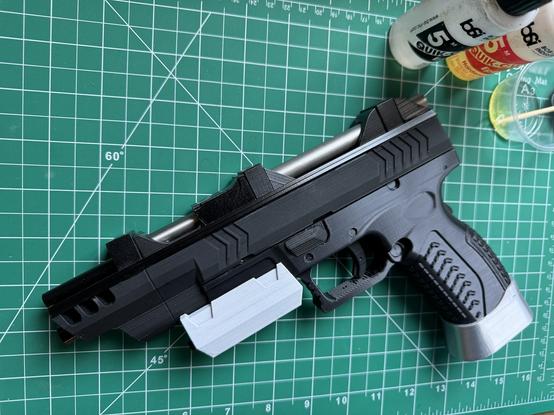 A 3D-printed prop of an MCRN pistol from The Expanse. Not a real gun, if you somehow couldn't tell.