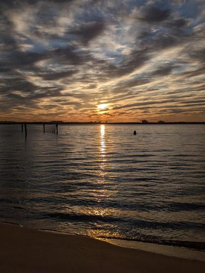 Early morning sunrise sky over botany bay
