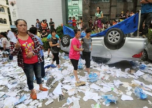 Riots in China 
People stormed a government building,  destroyed files, and flipped a car
lirongguo718632082