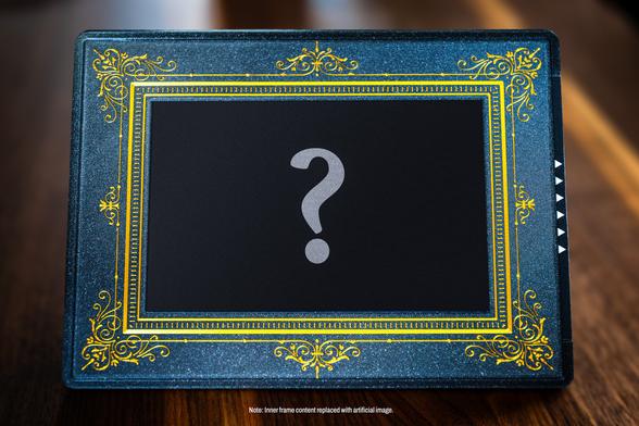 A picture frame with golden ornaments. The center of the picture frame shows a black cover with a question mark in the middle.