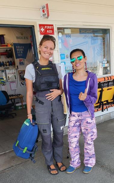 Me & my young female sailing instructor, Kate, in front of dockside office.