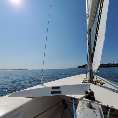 Scenic ocean view, from my front seat in Martin 16 sailboat. Clear blue skies.