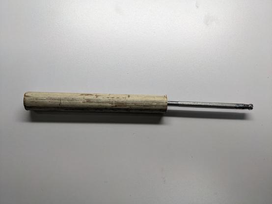 Decorative leatherworking tool in hand made handle