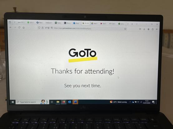 Photo of my laptop showing final screen of our ACAS webinar, run by GoTo - white screen, in middle in black big writing the GoTo logo, yellow underlining, underneath “thanks for attending, see you next time