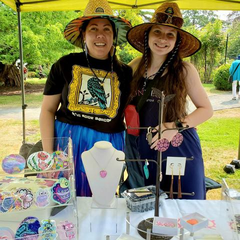 Chrystal & assistant with some of creative wares for sale.