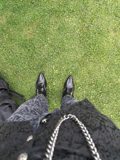 Goth feet wearing pointy footwear