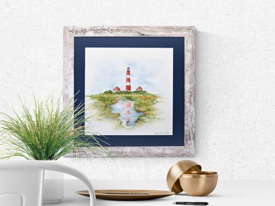 Gerahmtes Aquarell Darstellung des Leuchtturms Westerhever, über Tisch hängend Fotografiert