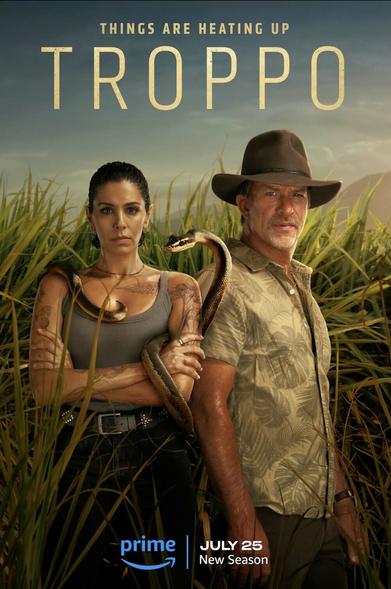 Nicole Chamoun and Thomas Jane with a snake between them and cane fields behind them on the poster for Troppo