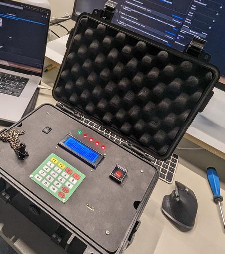 A "nuclear football" style briefcase, with two USB ports, a screen, keypad and launch button