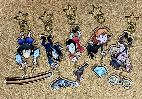 Linked acrylic charms of the Lupin III gang.