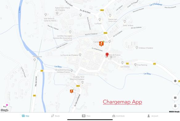 A map showing locations in a small Pyrénées village in France, including various amenities such as shops and charging stations. Notable roads and waterways like Rue de L'Hôpital, Le Blau, and L'Hers are marked.