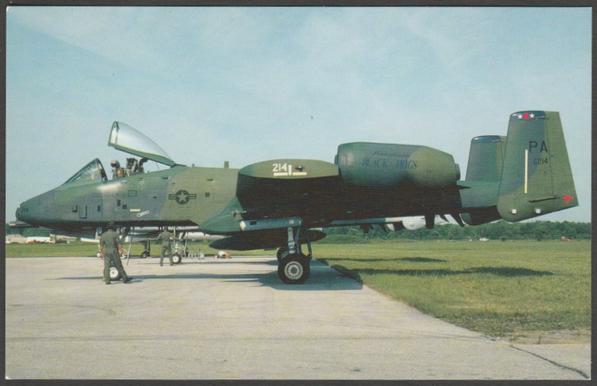 Printed colour postcard showing a view of the Fairchild Republic A-10 Thunderbolt II, commonly known as the 'Warthog', of the 11th Fighter Group of the Pennsylvania Air National Guard.
Published by aviationcards.com, Alameda CA, No 21.
Postally unused.
Excellent condition, with very slight corner bumps.