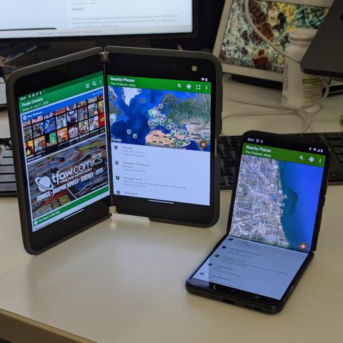 razr+ 2024 standing next to my venerable Surface Duo. Now I have both orientations covered!