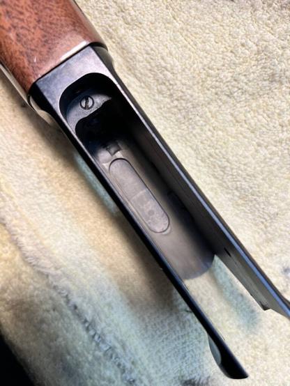 looking inside the action housing of the browning, you can now see a thoroughly cleaned out slot where the insert goes into.