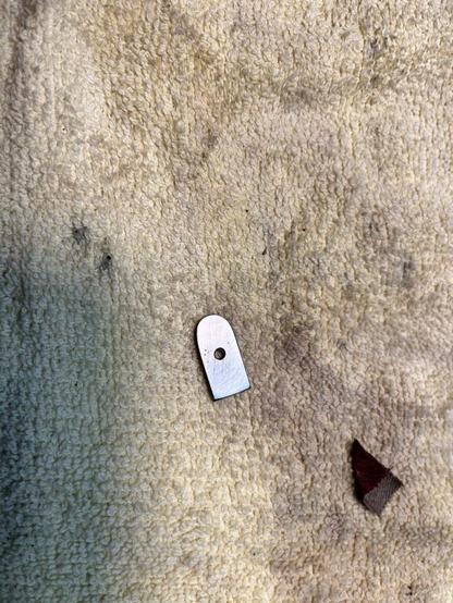 this is the insert of the browning rifle that has come loose. when it does this, the lever will not close and you cannot pull the trigger.