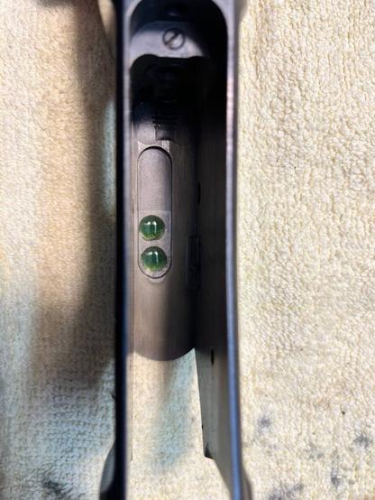 one can now see two green drops of loctite in the roof of the action housing.
