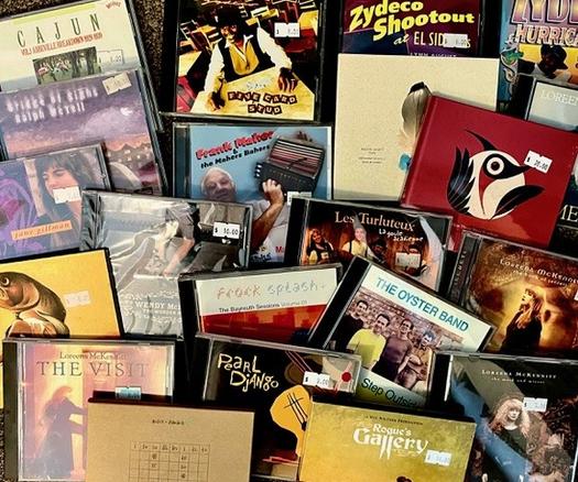The screen is literally carpeted with overlapping CD albums layered like shingles on a roof, all of which offer delightful accordion music listening experiences.