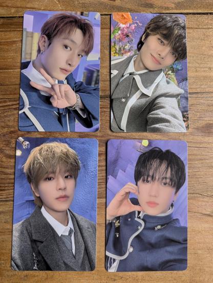 Four photocards of skz from the magic school fanmeeting: Bang Chan, I.N, Seungmin, Changbin