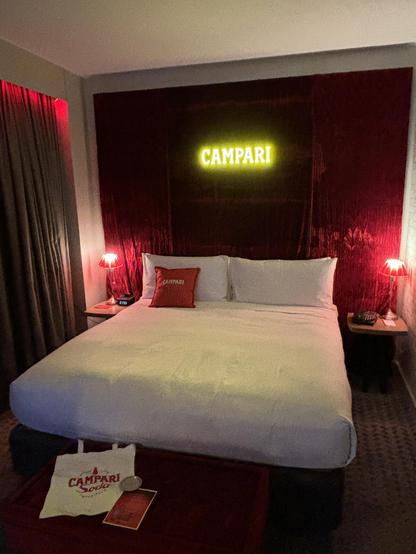 Very red room with Campari-themed decor.