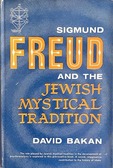A book entitled 'Sigmund Freud and the Jewish Mystical Tradition' by David Bakan. Titles are in white and gold on a light blue background which has a faint spiral design. A small diagram from the book appears on the top left corner.