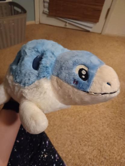 a squishable mosasaurus plush