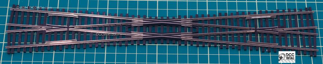 Image of a PECO Unifrog SL-U8364 crossing showing frog detail.