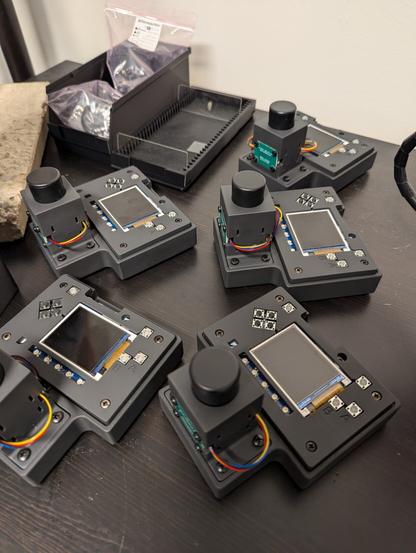 Five Open Colorimeters on a table