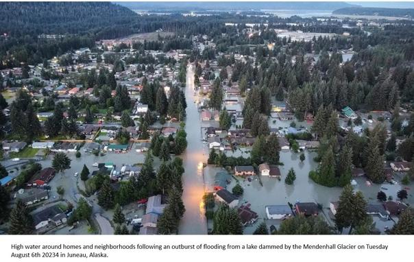drone photo - aerial - oblique - High water around homes and neighborhoods following an outburst of flooding from a lake dammed by the Mendenhall Glacier on Tuesday August 6th 2024 in Juneau, Alaska.