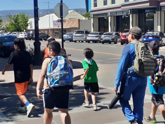 Pedestrians crossing Main Street in Grand Junction, Colorado.