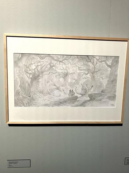 Drawing of a forest scene with dragon-like creatures resting on the ground and a group of travellers looking at them. Endpapers for Assassin’s Quest by Robin Hobb, art by John Howe.
