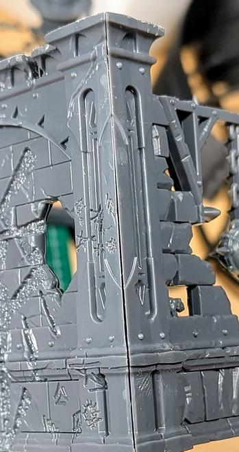 A plastic wall with a tiny crack in the corner, where both parts meet, seen from the outside