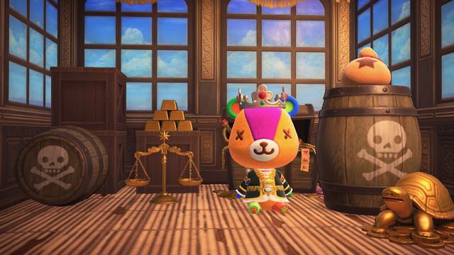 Animal Crossing: New Horizons screenshot. Image shows Stitches dressed in a long, Pirate King robe and a silver Pirate crown. He is sitting on a shambly, mat on top of wooden floor with Pirate Ship wallpaper. The room is intentionally narrow. To the right of Stitches is an upright barrel with a skull and crossbones on it and a bag of bels on top of it, a golden turtle is in front of it. To the left of Stitches are golden scales with a crate with golden bars on top of it. To the left of the crate is another stack of crates with a sideways barrel with a skull and crossbones on the top of the barrel. Behind Stitches is a wide open treasure chest. He looks happy. It's good to be Pirate King.