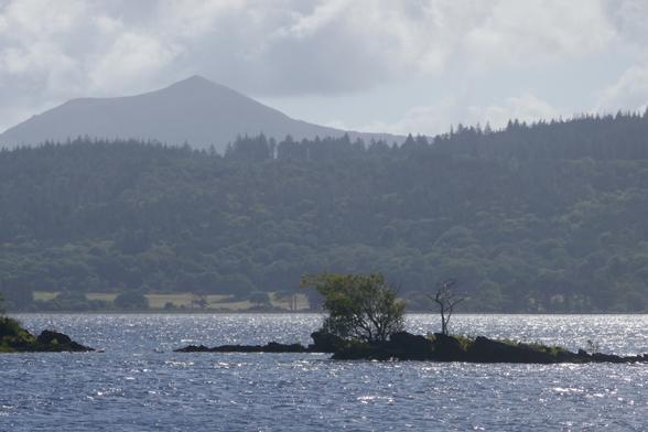View over lake towards mountain landscape