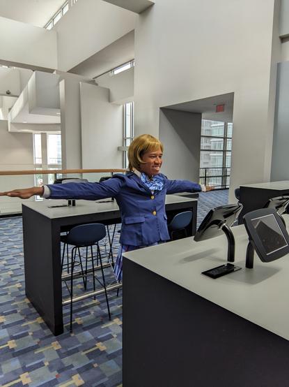 Me T-posing in Hanayo cosplay in front of a computer.