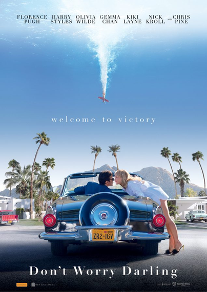 Cover for the movie Don't Worry Darling featuring a couple kissing in a classic car in the foreground, against a backdrop of blue skies, palm trees and a red plane falling down in a tailspin