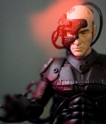 Miniature of Captain Jean Luc Picard dressed as the Borg from the 2-part episode where he was briefly assimilated.

Edited to create a red glow centered around the fixture they installed on his head.